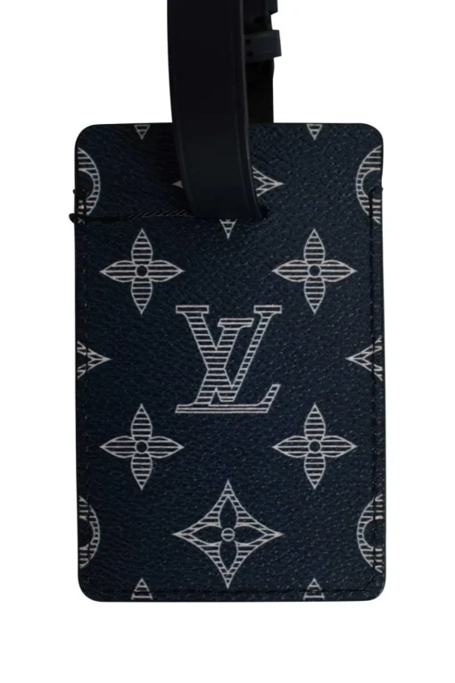 Limited edition Louis Vuitton x Chapman brothers navy monogram luggage tag with lion screen print