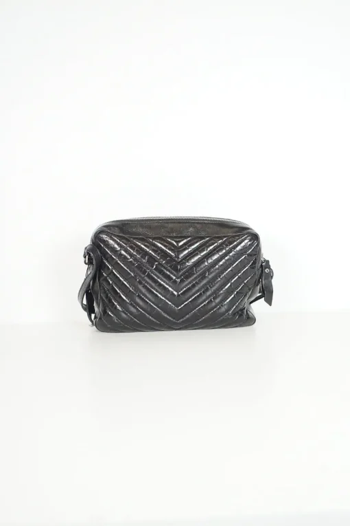 Lou camera bag; MONOGRAM SHOULDER BAG in wrinkled black leather with  AN ADJUSTABLE LEATHER STRAP.