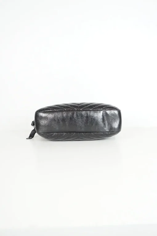 Lou camera bag; MONOGRAM SHOULDER BAG in wrinkled black leather with  AN ADJUSTABLE LEATHER STRAP.