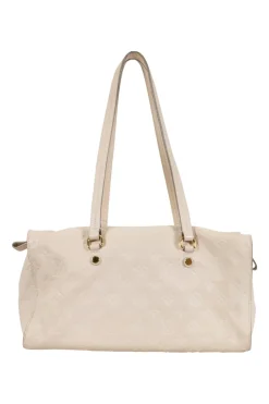 Louis Vuitton Empreinte monogram embossed calf leather bag in cream colour with zip closure. Rectangular shape with 2 shoulder straps. Bag has one external zipped pocket. Interior is fabric lined, with two side pockets, and a third on front panel. Gold toned hardware.
