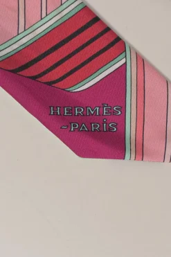 Magenta silk 'Sangles en Zig Zag' print Twilly scarf featuring original artwork by Virginie Jamin