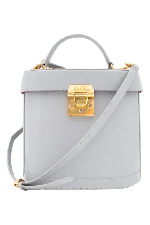 Mark Cross box bag with lid and handle, and push clasp in pebbled grey leather. Removable shoulder strap for cross body carry
