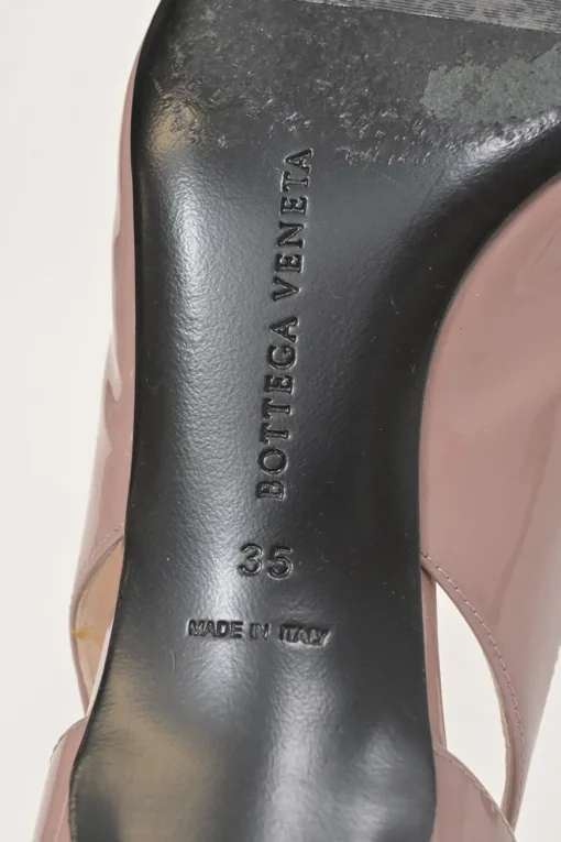 Mauve patent leather cutout slingback court pumps with chiseled square toe and buckle strap fastening
