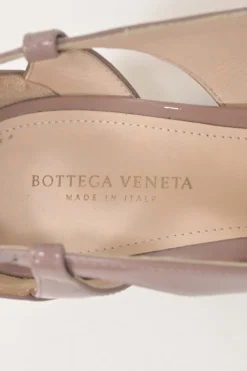 Mauve patent leather cutout slingback court pumps with chiseled square toe and buckle strap fastening