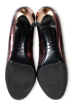 Metallic Purple  leather with bronze heels and silver buckle on top