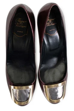 Metallic Purple  leather with bronze heels and silver buckle on top