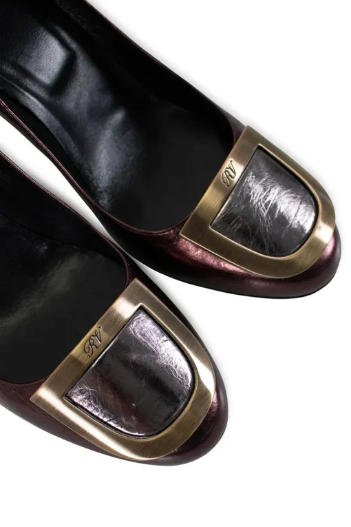 Metallic Purple  leather with bronze heels and silver buckle on top