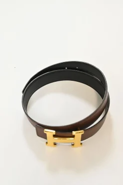 24mm Tan and black reversible Swift and Epsom calfskin mini Constance Martelee buckle belt