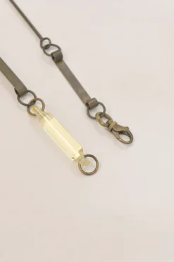 Moss green acrylic, horn and brass station necklace