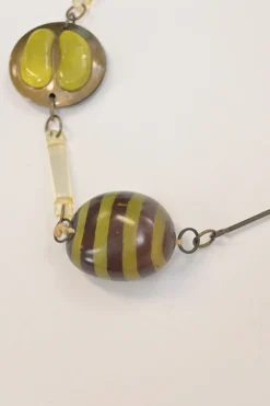Moss green acrylic, horn and brass station necklace