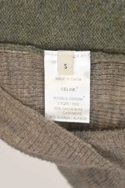Moss green cashmere-blend button-front cardigan with contrasting marled heather sleeves and back panel