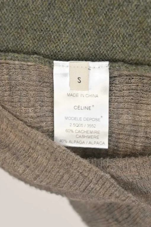 Moss green cashmere-blend button-front cardigan with contrasting marled heather sleeves and back panel