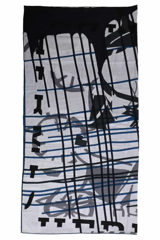 Multi-colour knit Fou Liquid Puzzle shawl wrap scarf featuring original artwork by Cyrille Diatkine and Joachim Metz