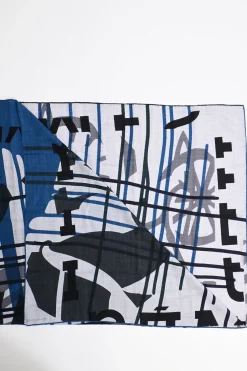 Multi-colour knit Fou Liquid Puzzle shawl wrap scarf featuring original artwork by Cyrille Diatkine and Joachim Metz