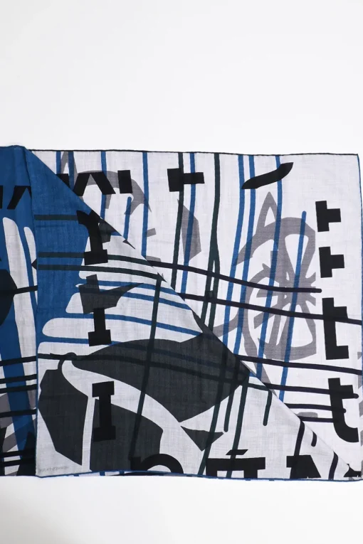 Multi-colour knit Fou Liquid Puzzle shawl wrap scarf featuring original artwork by Cyrille Diatkine and Joachim Metz