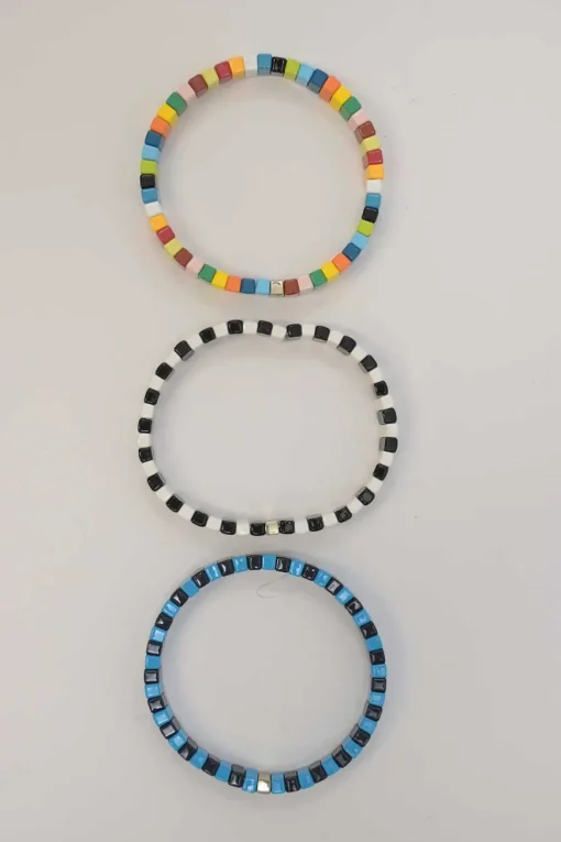 Multi-colour metal and enamel stacked stretch bracelets