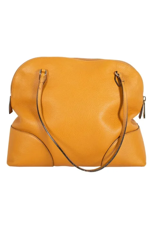 Mustard grained leather shoulder bag with double leather strap handles and light gold tone hardware