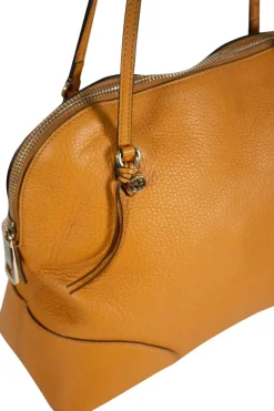 Mustard grained leather shoulder bag with double leather strap handles and light gold tone hardware