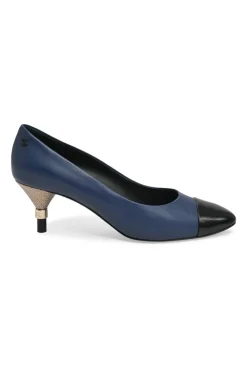 Navy and black contrast leather almond-toe pumps with patterned gold-tone metal heels and black Coco logo on ankle counter