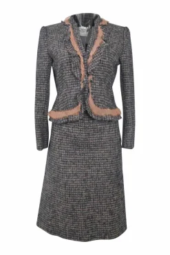 Navy and blush wool-blend bouclé tweed single breasted notch lapel jacket and A-line knee-length skirt suit set