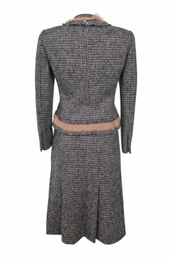 Navy and blush wool-blend bouclé tweed single breasted notch lapel jacket and A-line knee-length skirt suit set