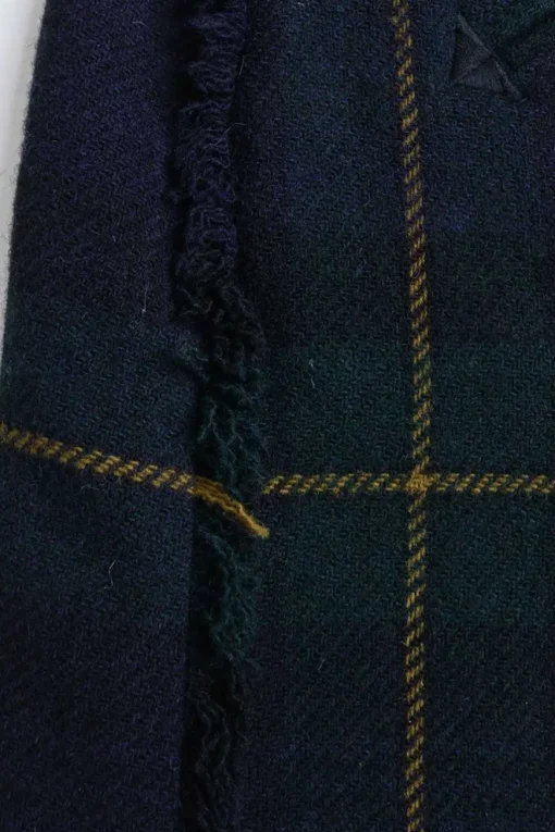 Navy and green plaid pull-on micro-mini skirt with unfinished raw edges and slanted smile pockets