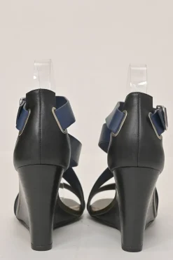 Navy and olive green leather round-toe criss-cross wedge sandals with buckle strap fastening