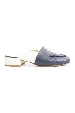 Navy and white quilted leather square-toe mules with beaded Coco Mark at vamp