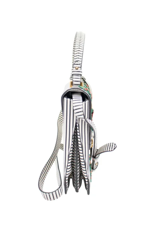 Navy and white stripe leather bag with gold-tone ornament and leather floral applique, comes with detachable cross-body strap
