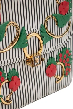 Navy and white stripe leather bag with gold-tone ornament and leather floral applique, comes with detachable cross-body strap