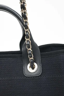 Navy blue lambskin leather-trimmed canvas Small Deauville Tote bag with gold-tone hardware