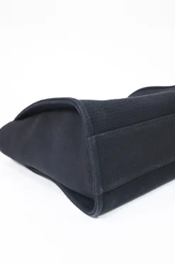 Navy blue lambskin leather-trimmed canvas Small Deauville Tote bag with gold-tone hardware