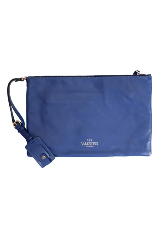 Navy clutch with wrist strap and brand stamp