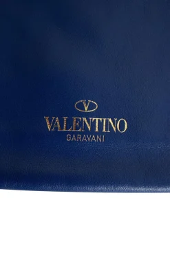 Navy clutch with wrist strap and brand stamp