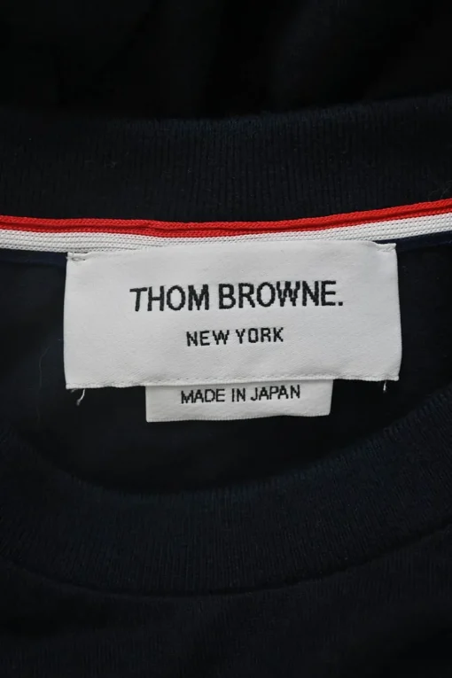 Navy cotton jersey neck pullover long sleeve knit top with 4-bar bicep stripe and vented hem
