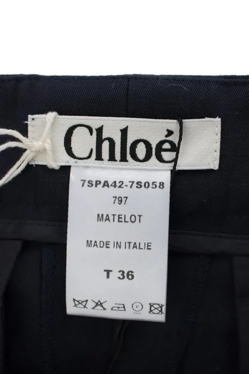 Navy cotton wide leg trousers with both front and back pockets.