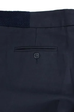 Navy cotton wide leg trousers with both front and back pockets.