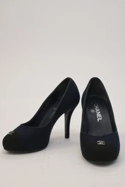 Navy fabric and leather round-toe platform pumps with metallic Coco Mark vamp appliqué