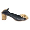 Navy goatskin and cork soft Spirit pumps with camellia vamp appliqué