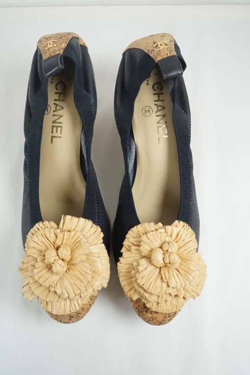 Navy goatskin and cork soft Spirit pumps with camellia vamp appliqué