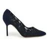 Navy lace and leather pointed toe pumps