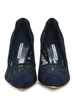 Navy lace and leather pointed toe pumps
