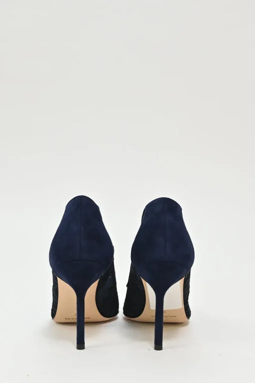 Navy lace and leather pointed toe pumps