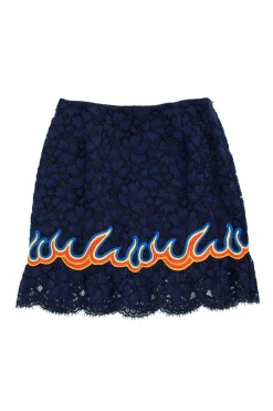 Navy lace knee-length skirt with graphic red, orange and blue appliqué