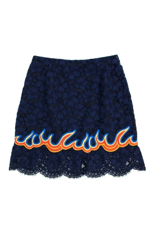 Navy lace knee-length skirt with graphic red, orange and blue appliqué