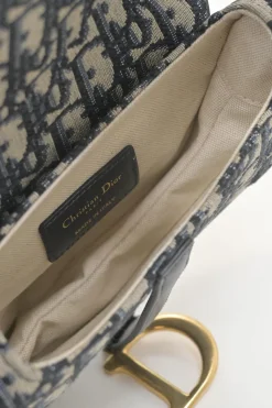 Navy Oblique canvas and leather saddle bag