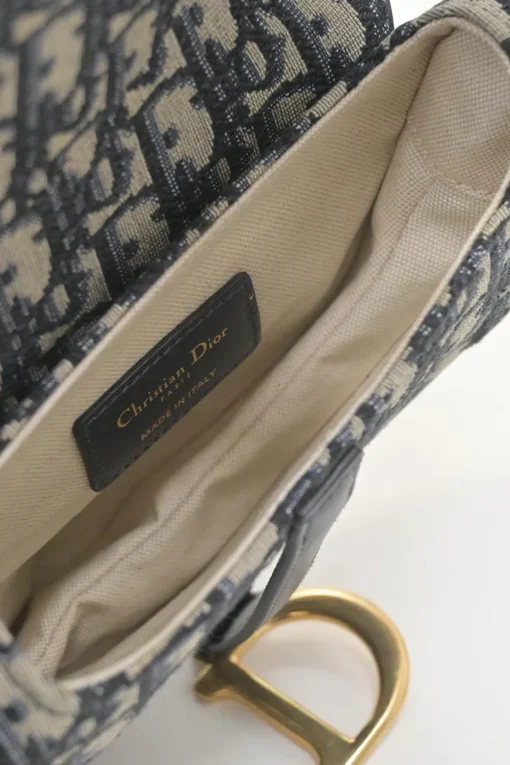 Navy Oblique canvas and leather saddle bag