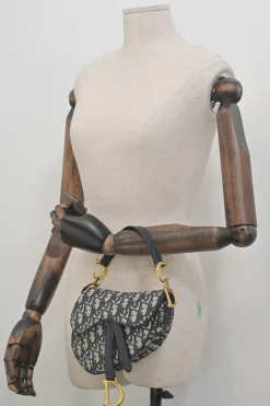 Navy Oblique canvas and leather saddle bag