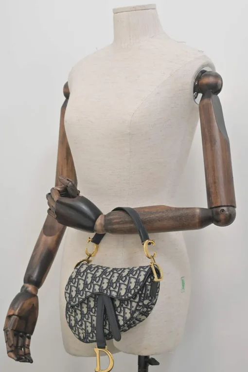 Navy Oblique canvas and leather saddle bag