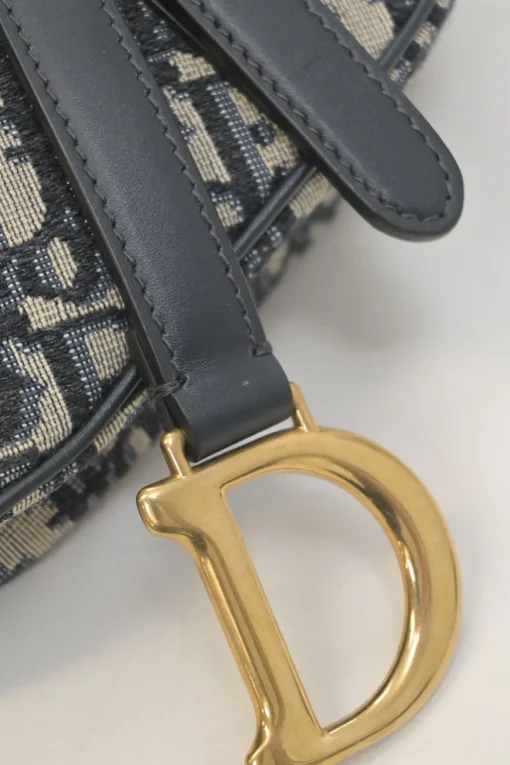 Navy Oblique canvas and leather saddle bag